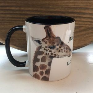 Judgy Giraffe coffee mug